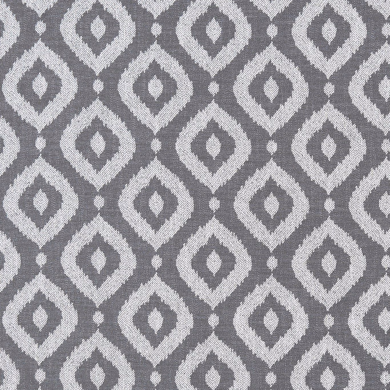 Charcoal woven fabric with pale irregular diamond motifs and a softly textured surface