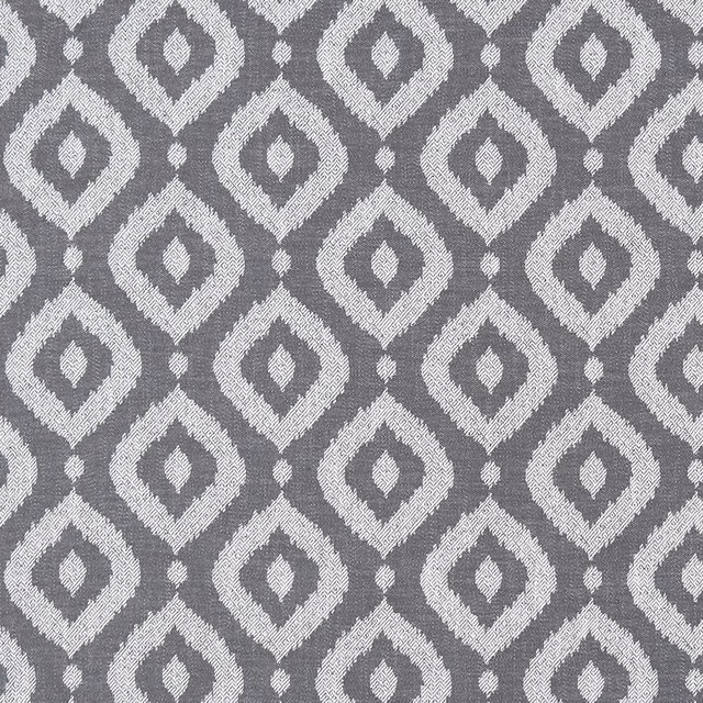 Charcoal woven fabric with pale irregular diamond motifs and a softly textured surface