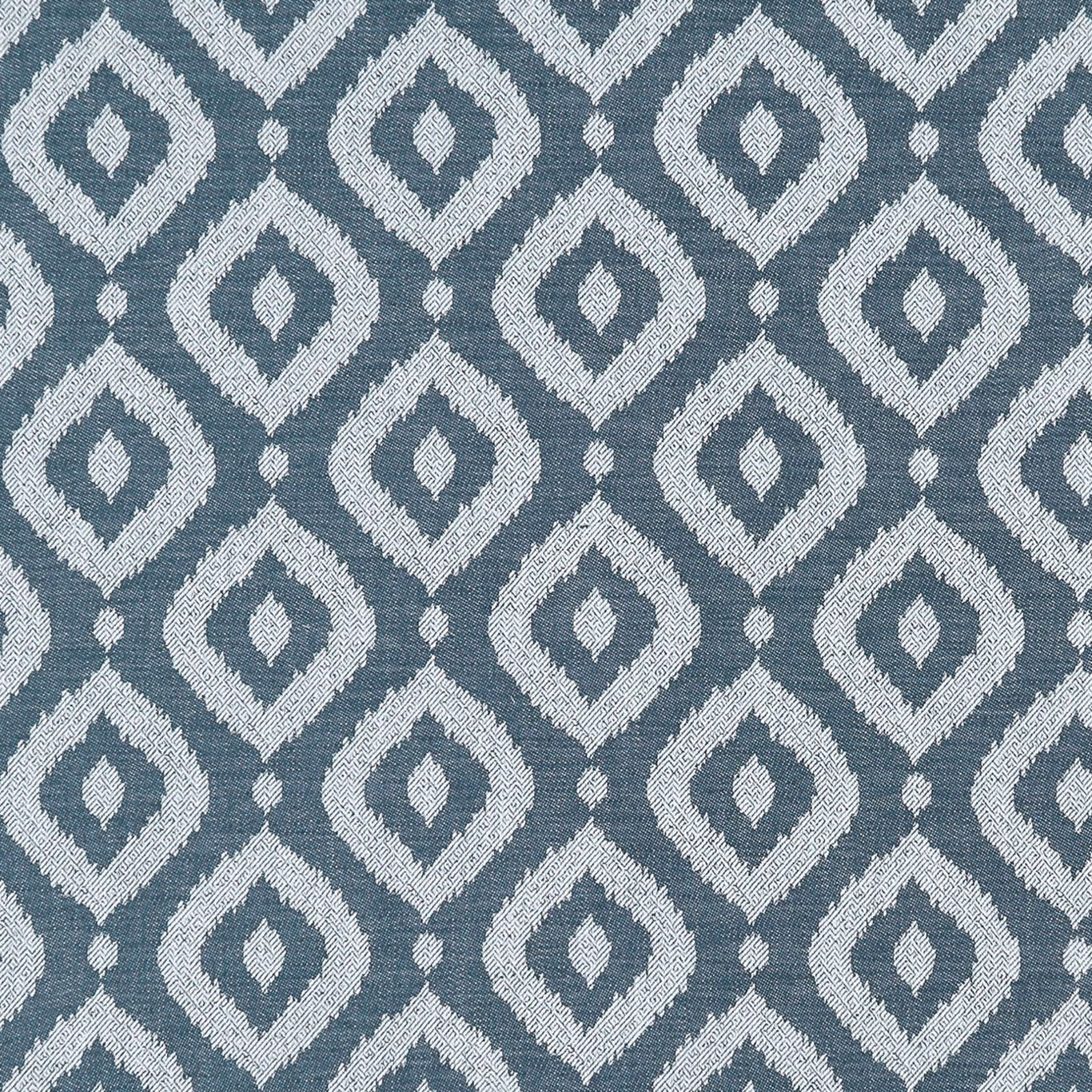 Cool denim-blue woven ground with ivory diamond motifs and tiny linking dots