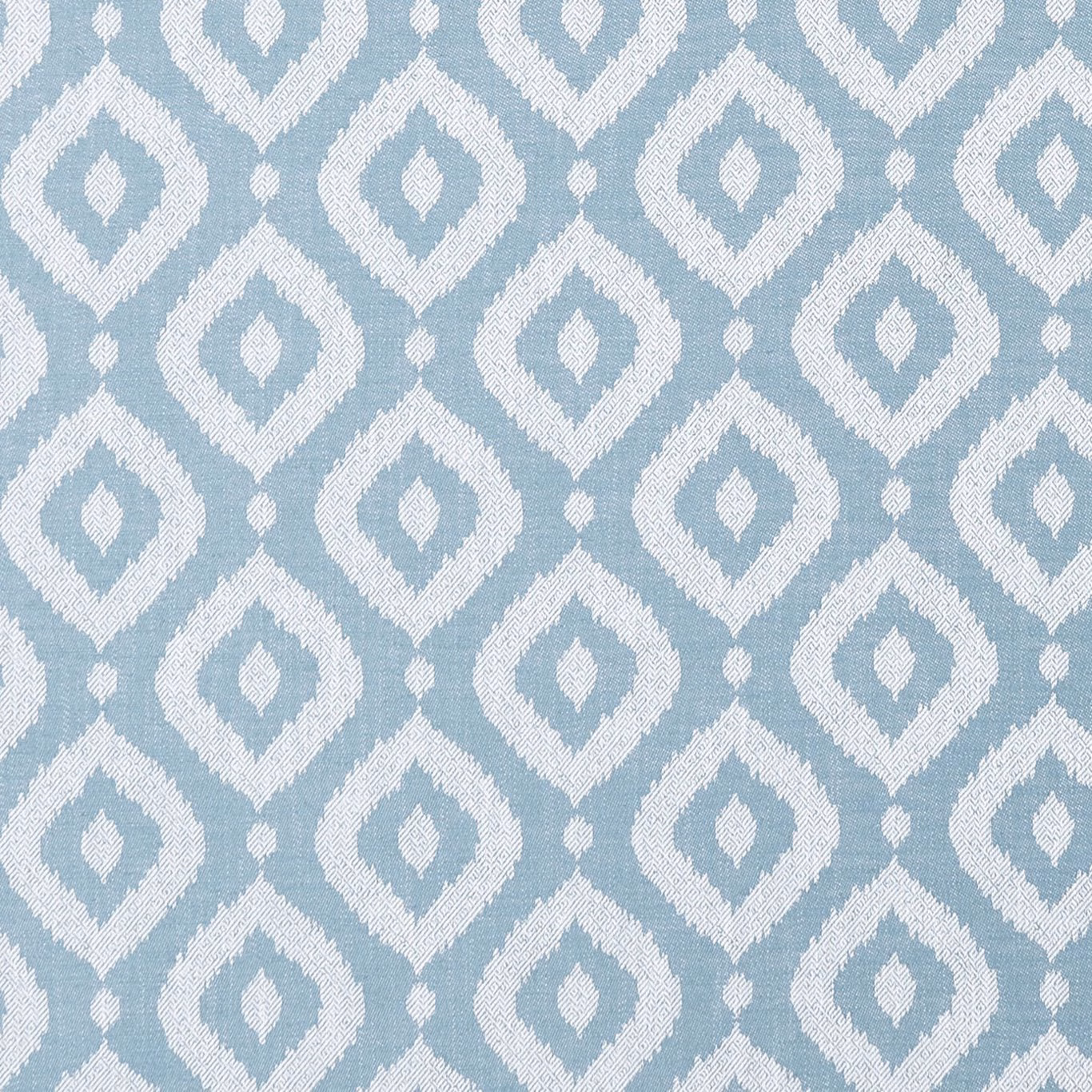 Pale mineral-blue and ivory woven diamond motifs with a softly nubby texture