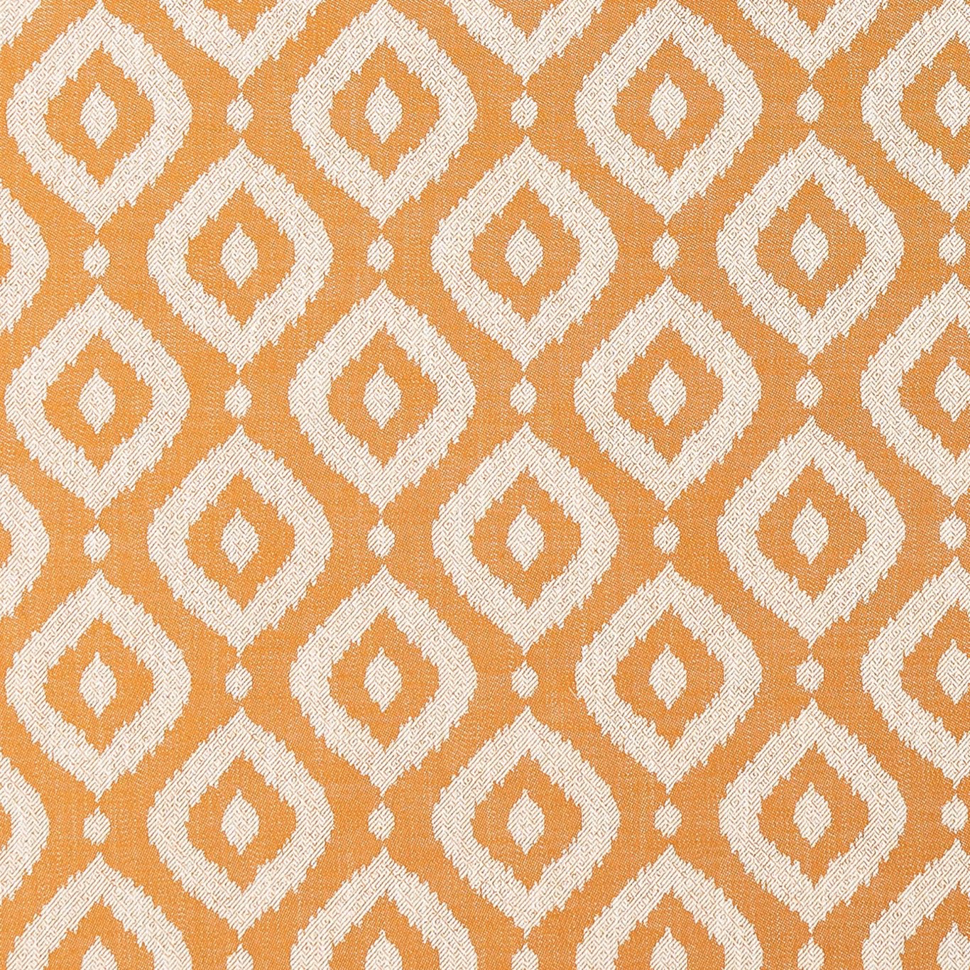 Burnt spice orange fabric with ivory textured diamond motifs in a repeating geometric weave