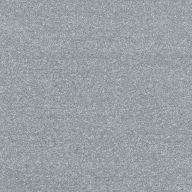 Close view of cool storm-grey fabric with fine salt-and-pepper woven texture