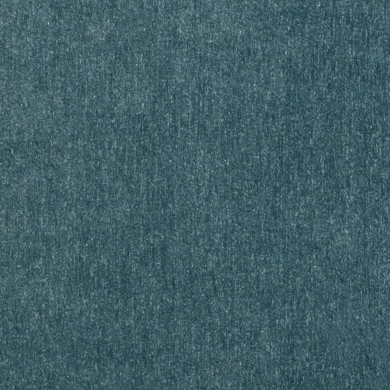 Close-up of cool blue teal Maculo Arctic with mottled vertical texture and fine pale flecks