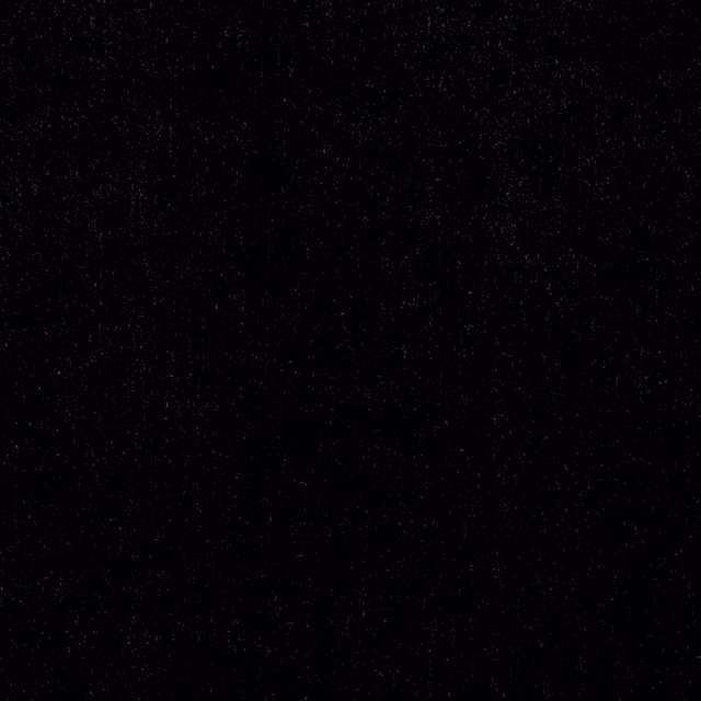 Near-black ebony textile with a barely flecked, softly textured surface