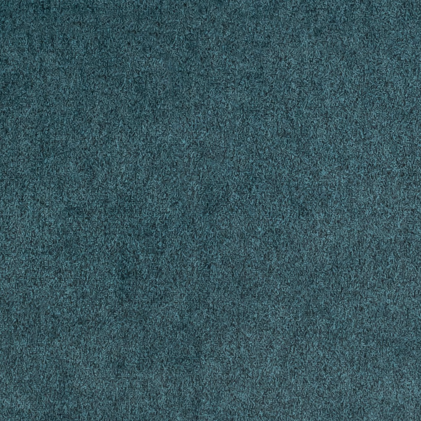 Close-up of deep blue teal fabric with a finely mottled, softly textured surface