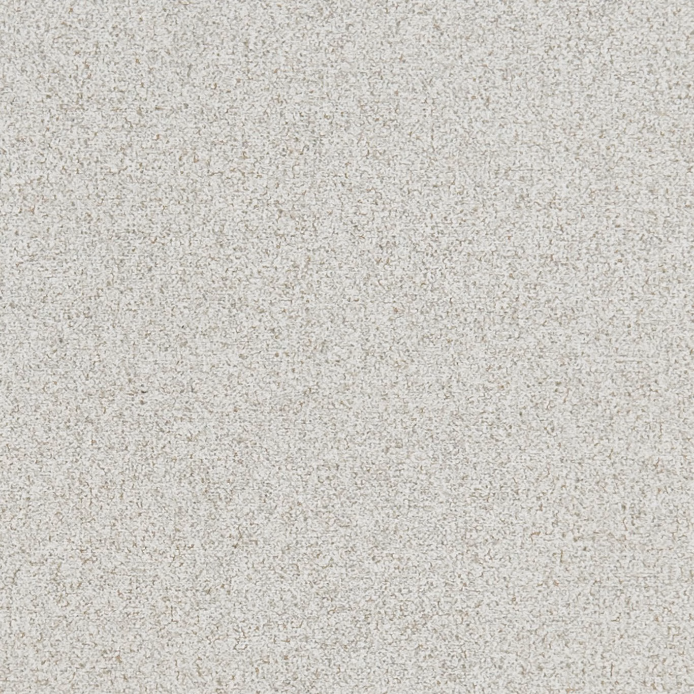 Close-up of pale natural greige textile with fine irregular ivory and taupe flecks