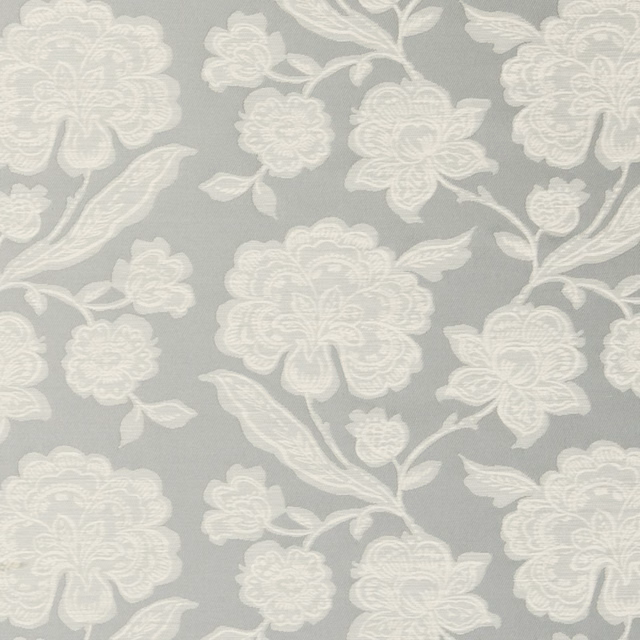 Cool mineral-grey fabric with ivory climbing flowers, outlined petals and leafy stems