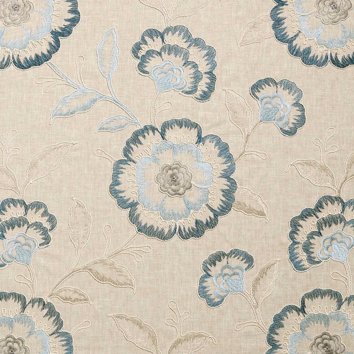 Beige woven ground with large denim-blue flowers and outlined leaves