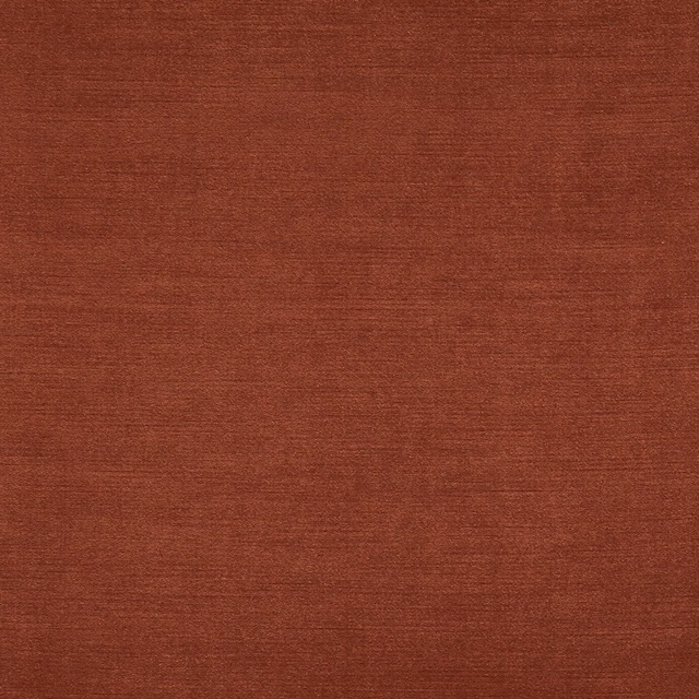 Close-up of Riva Spice in warm rust terracotta with a fine horizontal weave