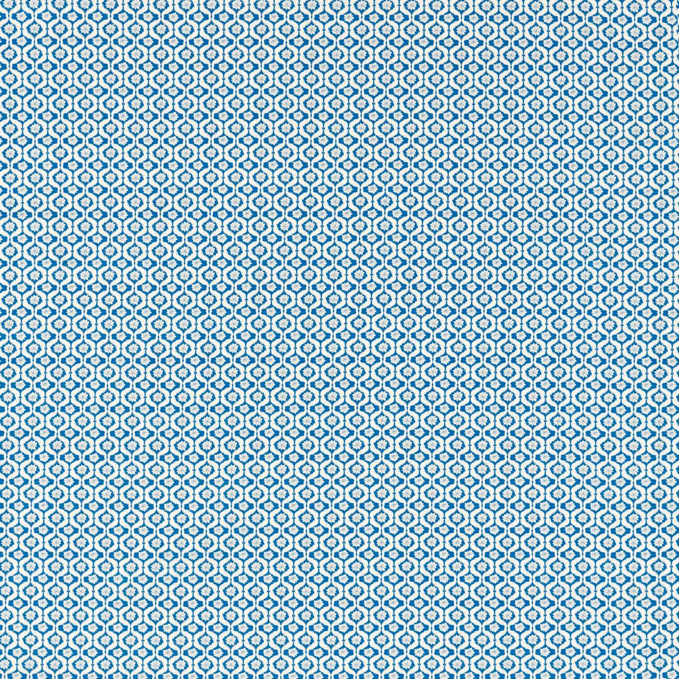 Deep cobalt blue woven fabric with tiny ivory geometric lattice motifs