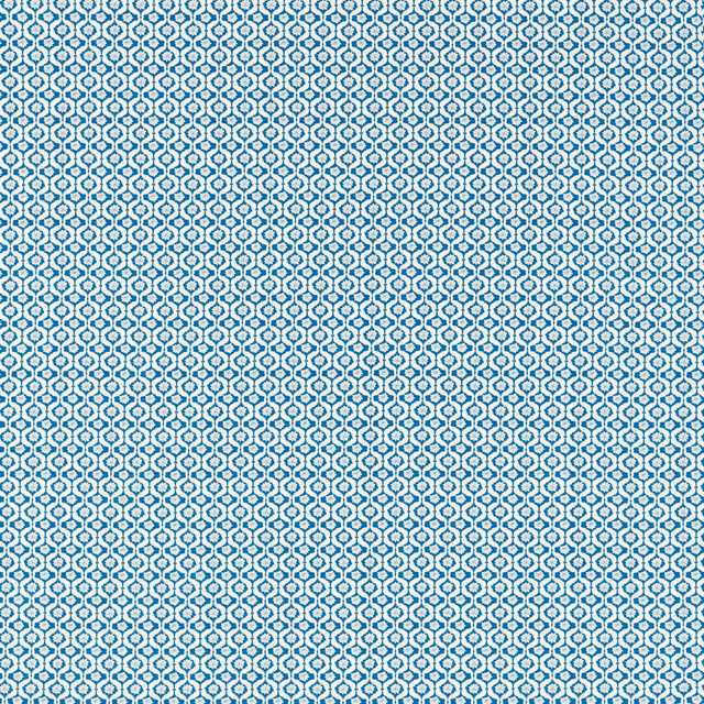 Deep cobalt blue woven fabric with tiny ivory geometric lattice motifs