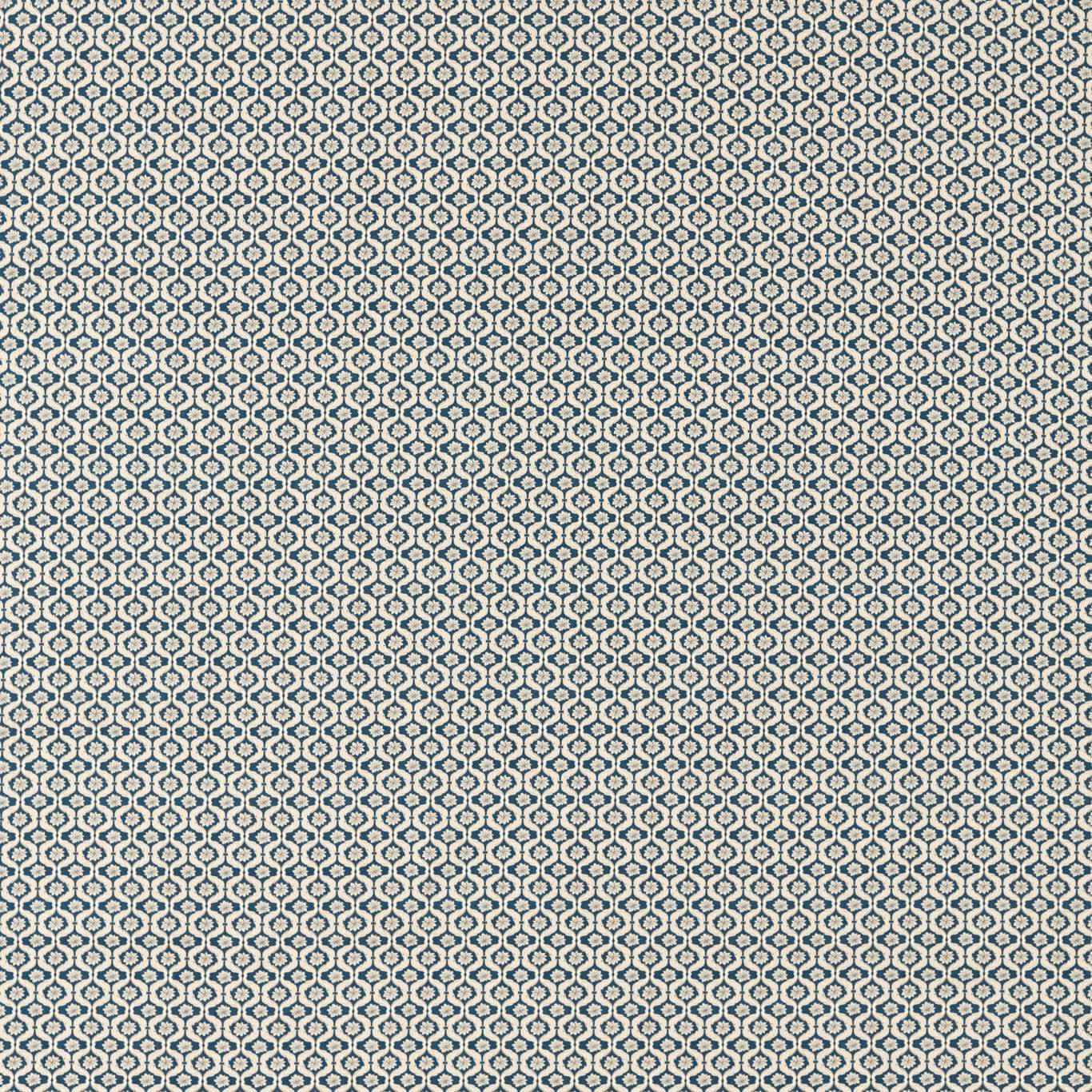 Midnight blue textile with densely repeated ivory geometric motifs and fine woven texture