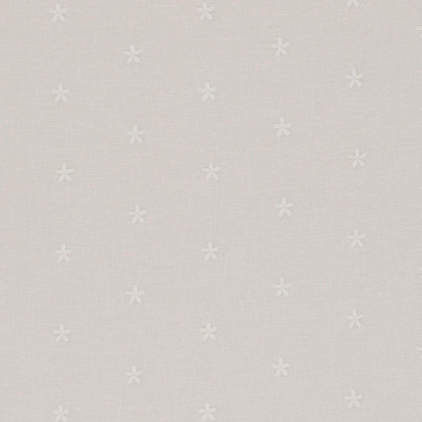 Pale ivory woven fabric with scattered small white flower motifs and fine texture