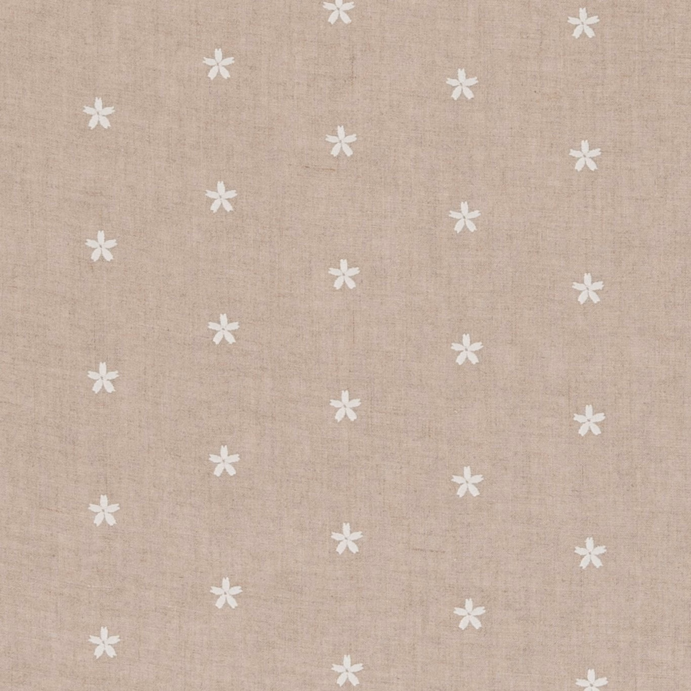 Warm beige woven fabric with scattered small white flower motifs and subtle natural texture