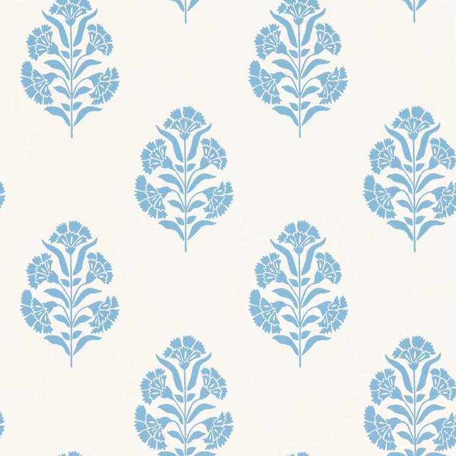Denim-blue floral sprigs repeating across a warm cream wallpaper ground