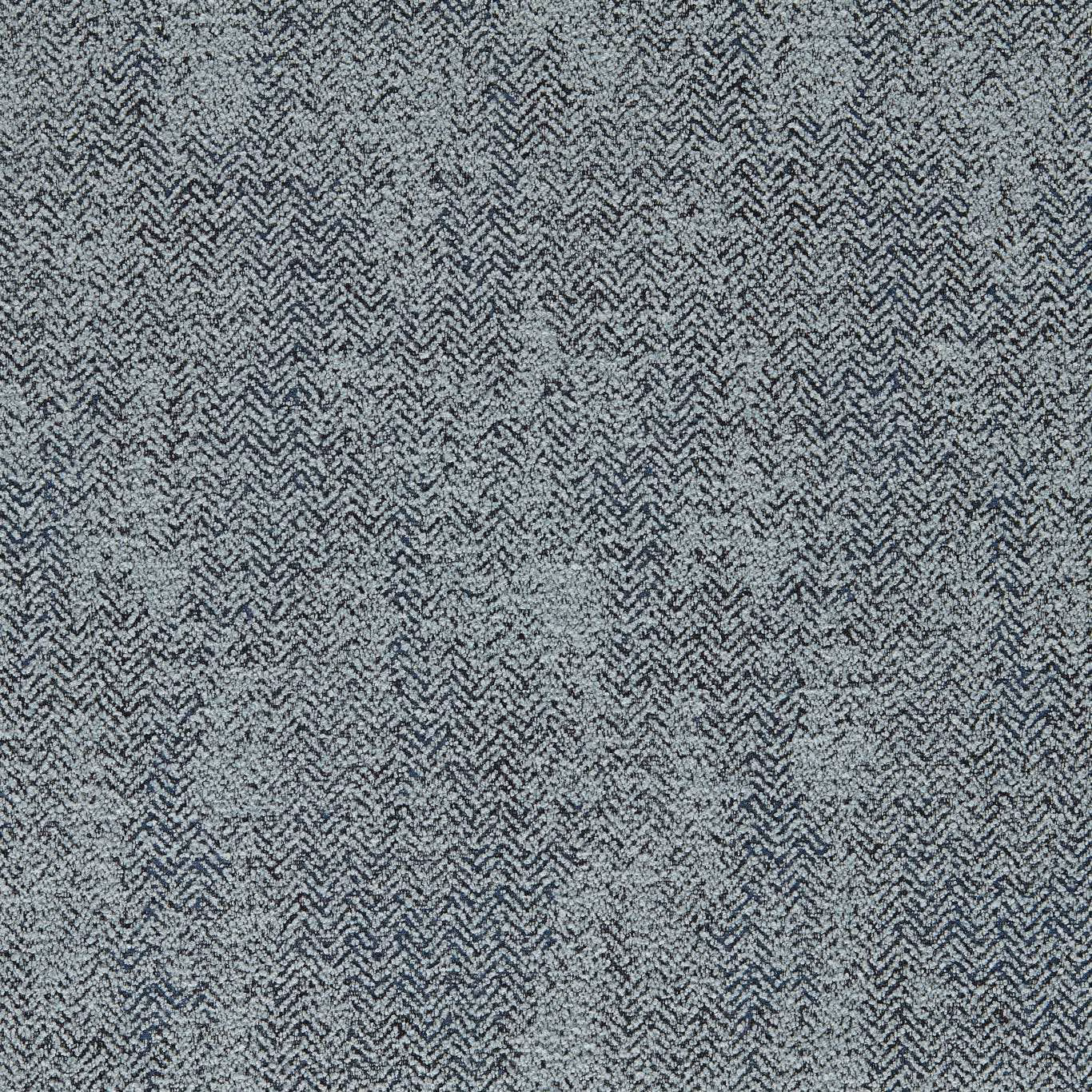 Muted denim-blue woven chevrons with charcoal flecks and softly mottled texture