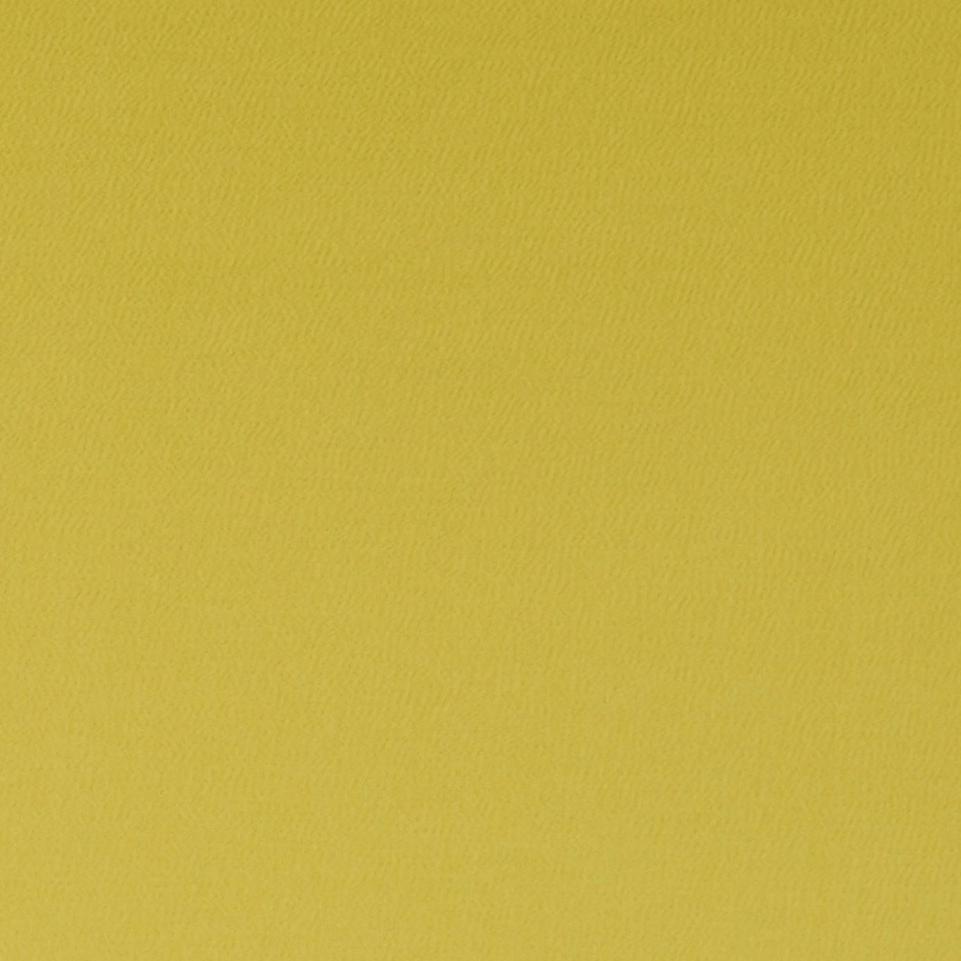 Close-up of bright chartreuse yellow-green fabric with a fine rippled woven texture