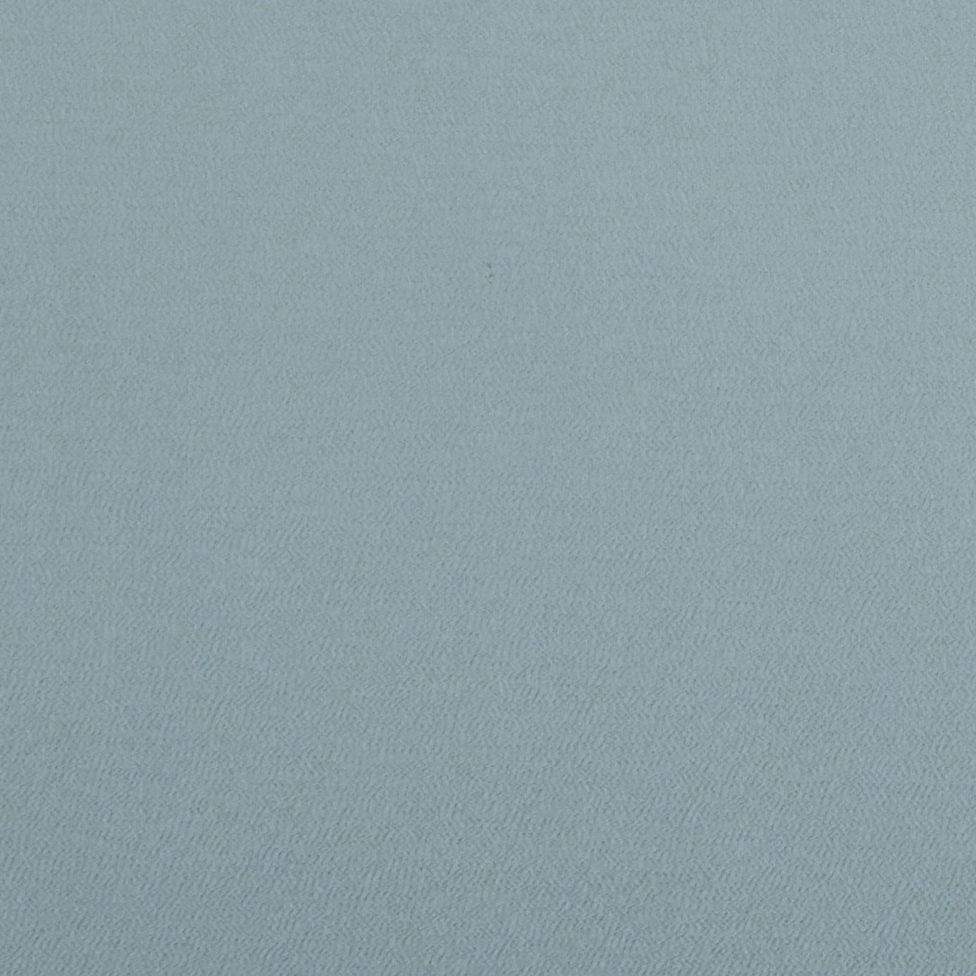 Cool eau de nil blue-green fabric with a fine, subtly diagonal woven texture