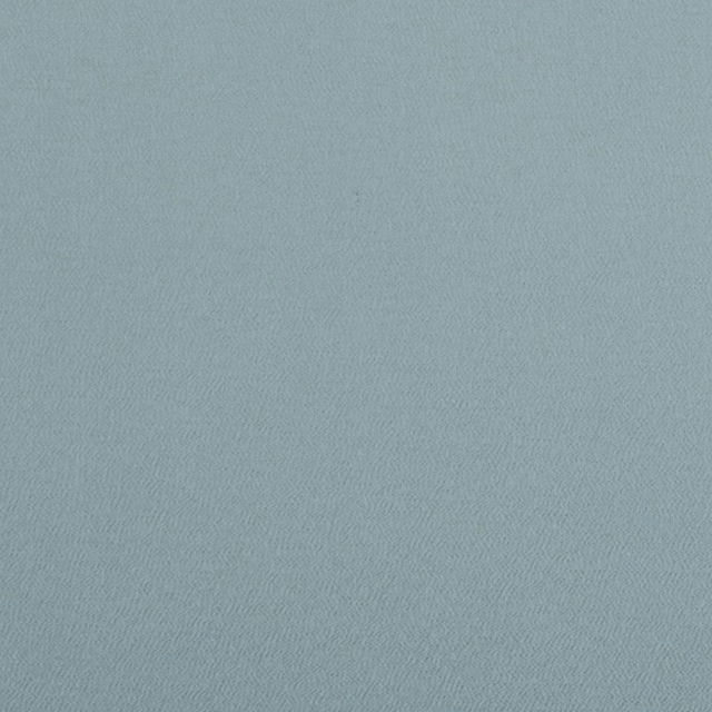 Cool eau de nil blue-green fabric with a fine, subtly diagonal woven texture