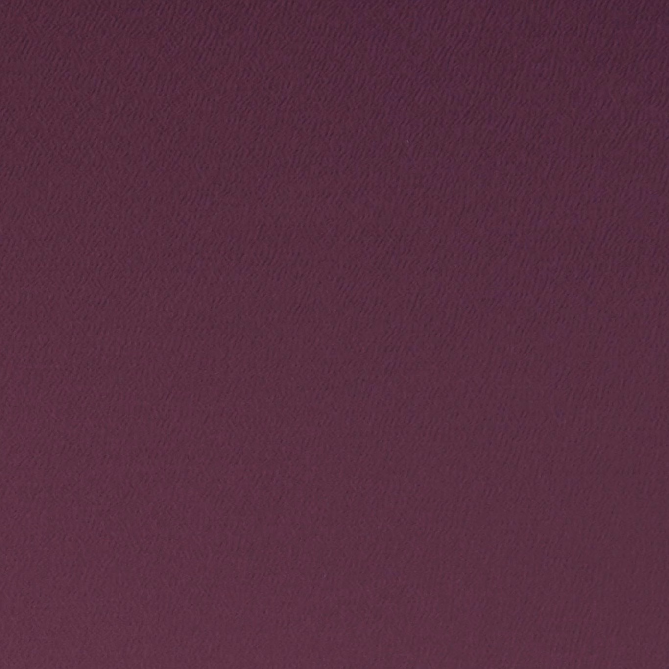 Deep grape-purple woven textile with a subtle rippled, light-catching surface