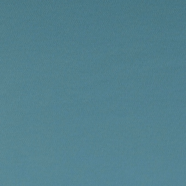 Muted kingfisher teal textile with a fine, subtly rippled woven surface