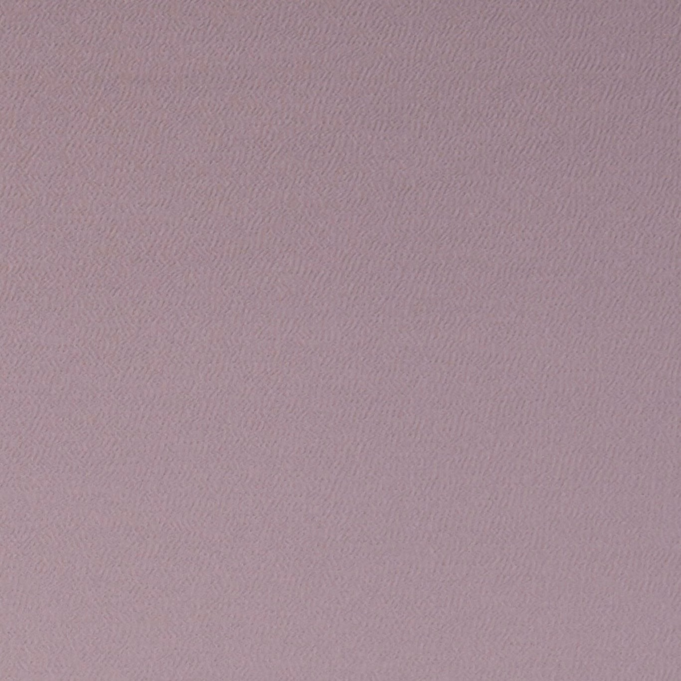 Dusty mauve textile with a fine, softly rippled woven texture