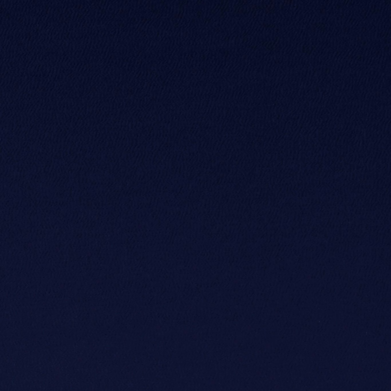 Deep midnight navy textile with a subtly textured, almost black woven surface