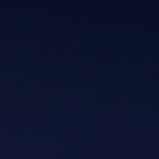Deep midnight navy textile with a subtly textured, almost black woven surface