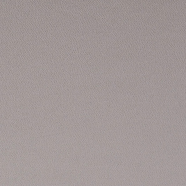 Misty grey fabric with a fine, softly rippled woven surface