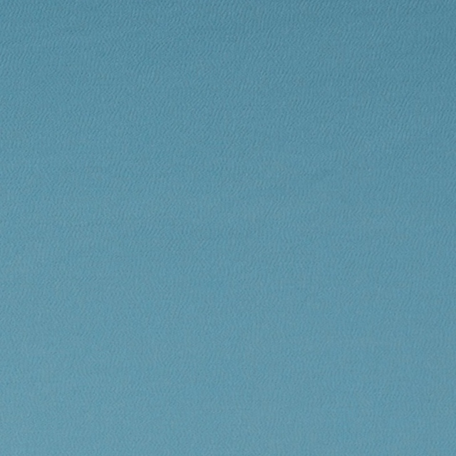 Cool ocean-blue teal textile with a fine, softly rippled woven surface