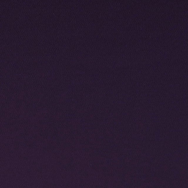 Deep petunia purple fabric with a barely visible fine diagonal woven texture