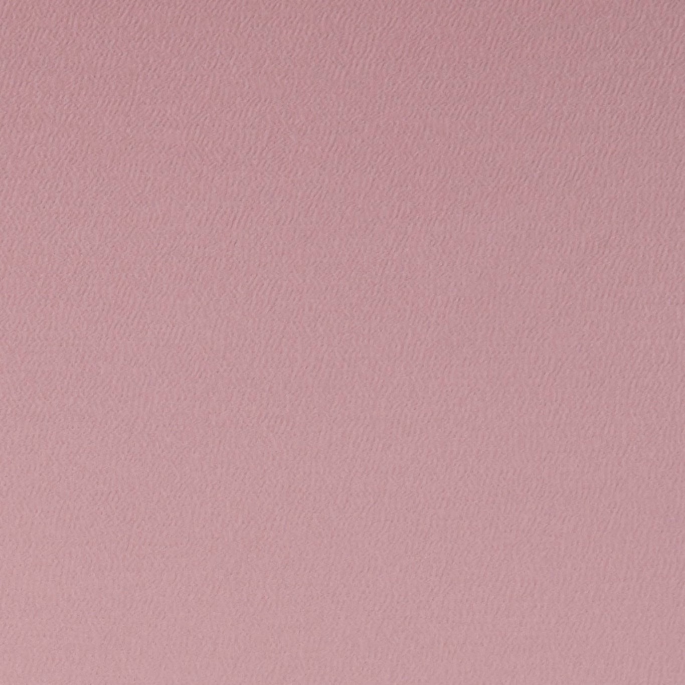Dusty rose pink fabric with a fine, subtly rippled woven texture