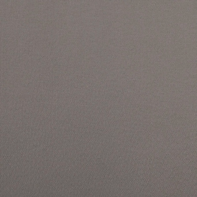 Smoky taupe-grey woven fabric with a fine, subtly rippled surface