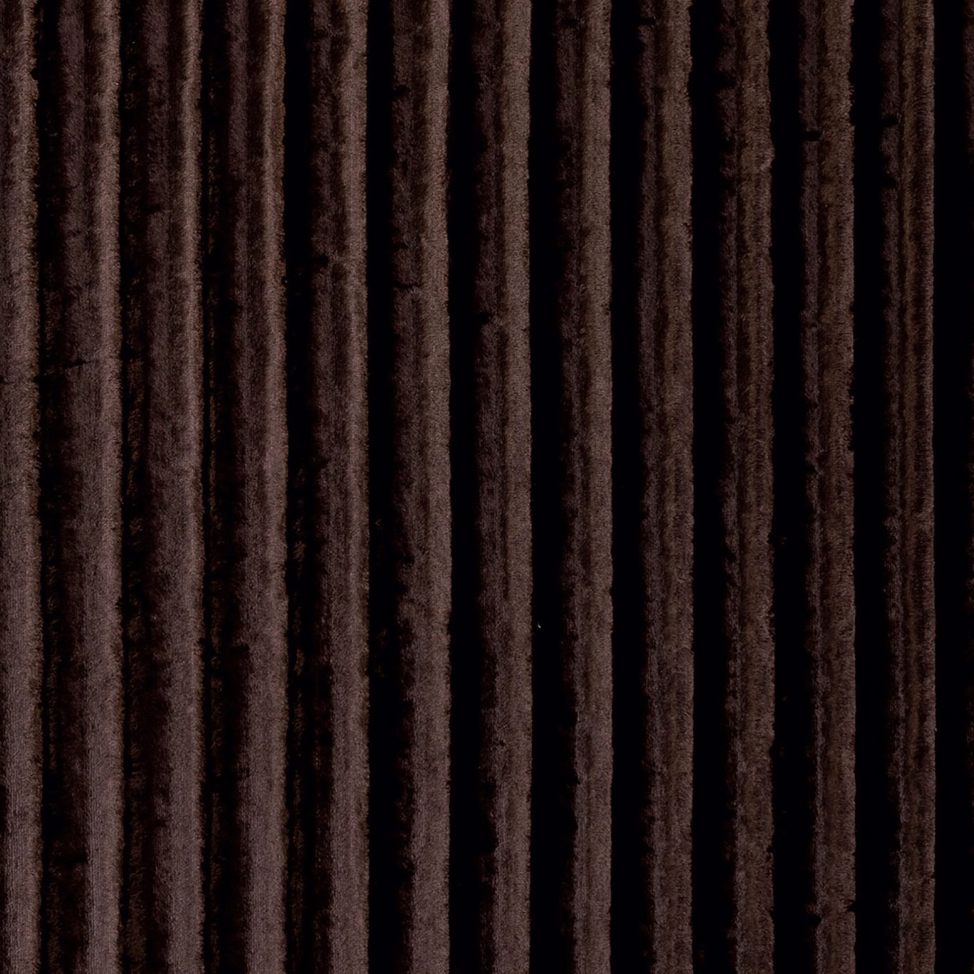Dark espresso velvet with irregular near-black vertical ribs and plush light-catching texture