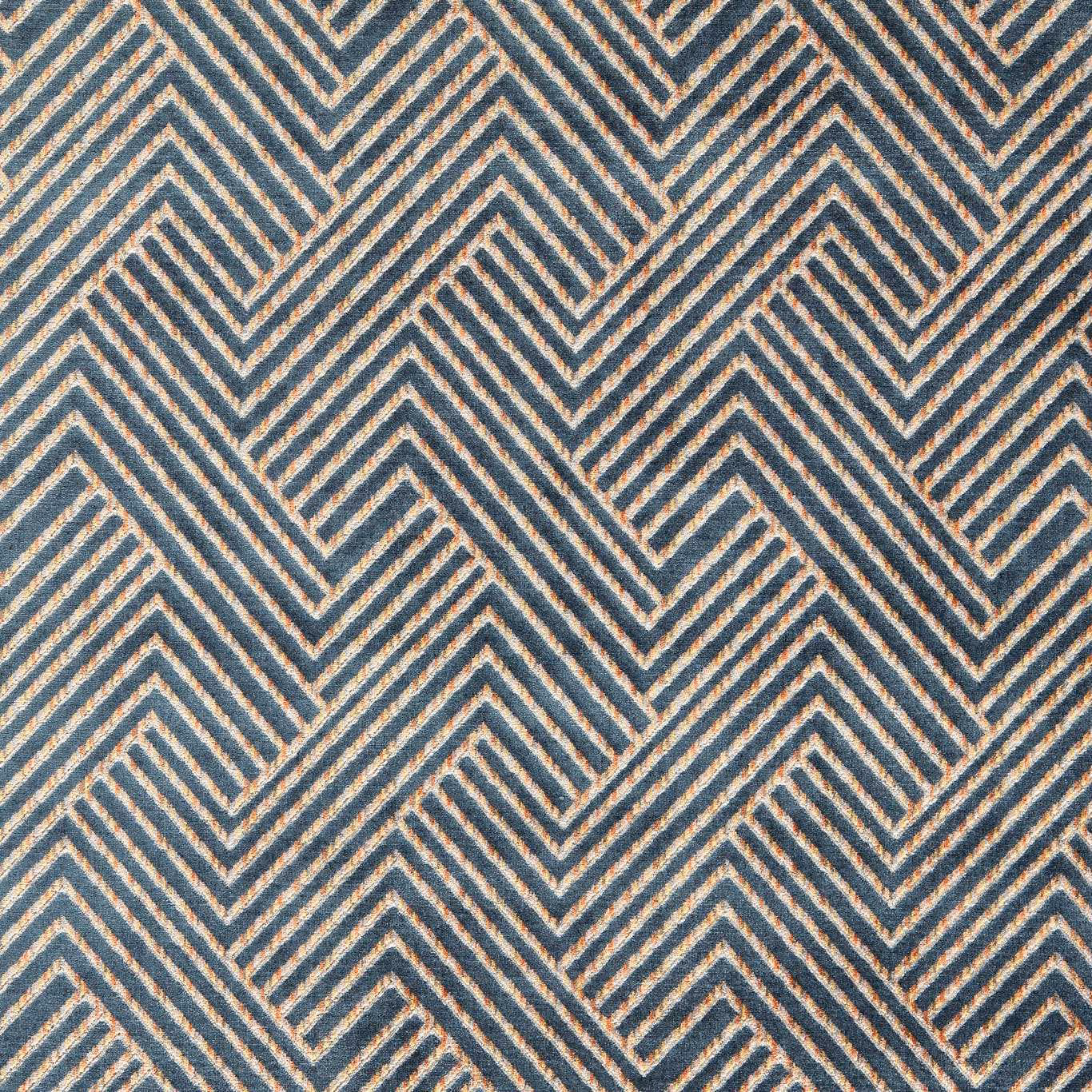 Blue-grey and charcoal chevron stripes woven over a warm beige textured ground