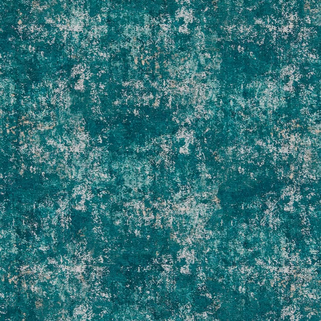 Mottled teal textile with pale distressed flecks and softly varied surface texture
