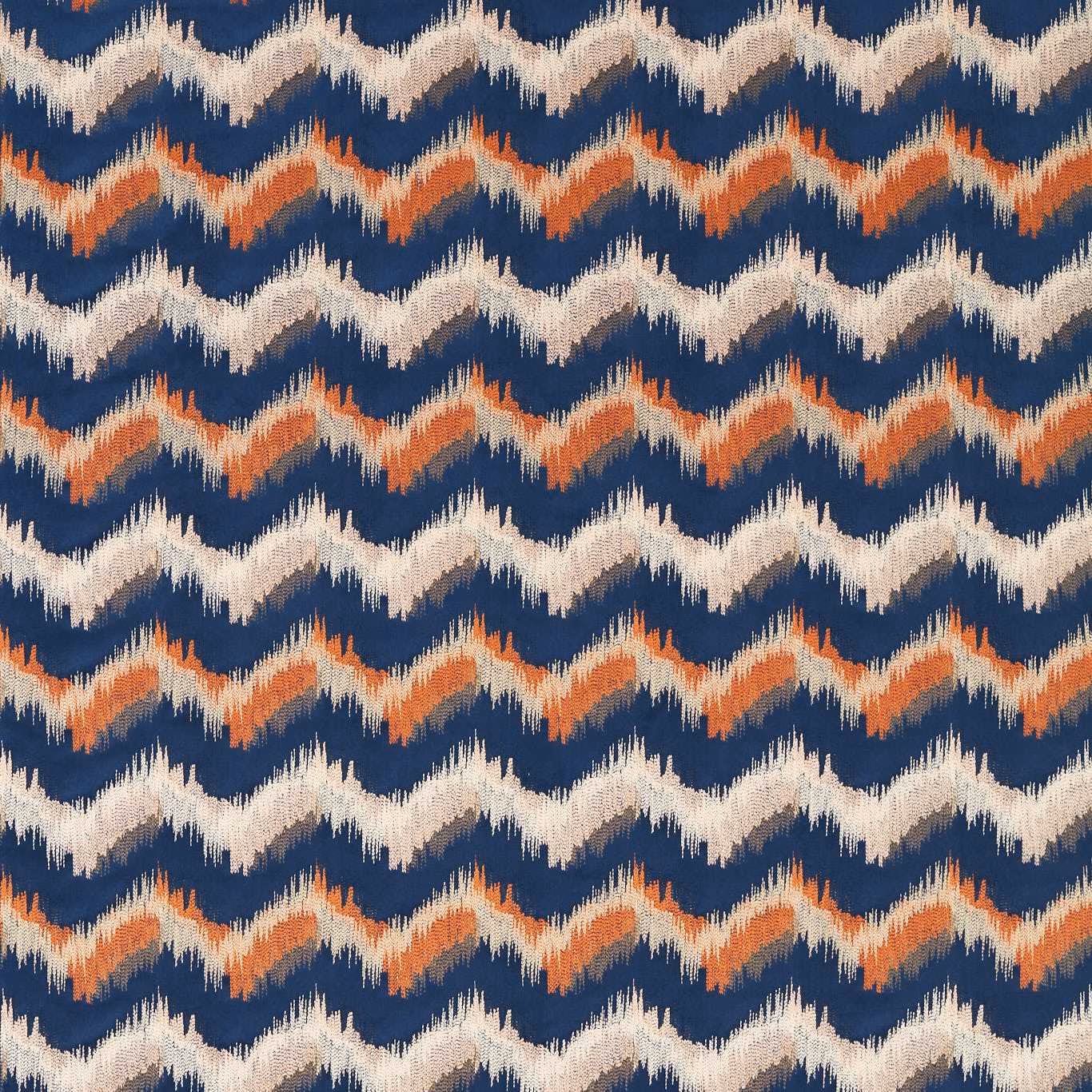 Midnight navy woven fabric with ivory and rust ikat zigzag bands