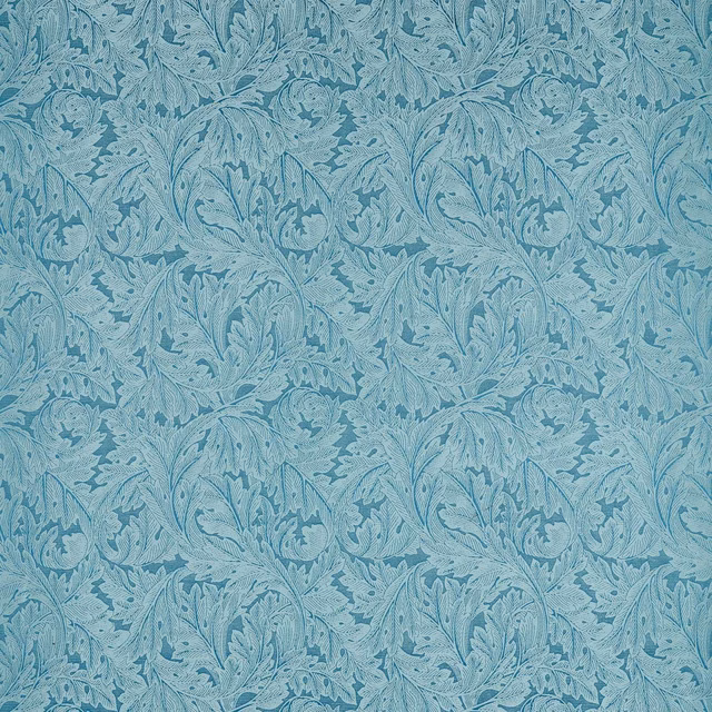 Cool denim-blue woven fabric with pale acanthus leaves and curling botanical stems