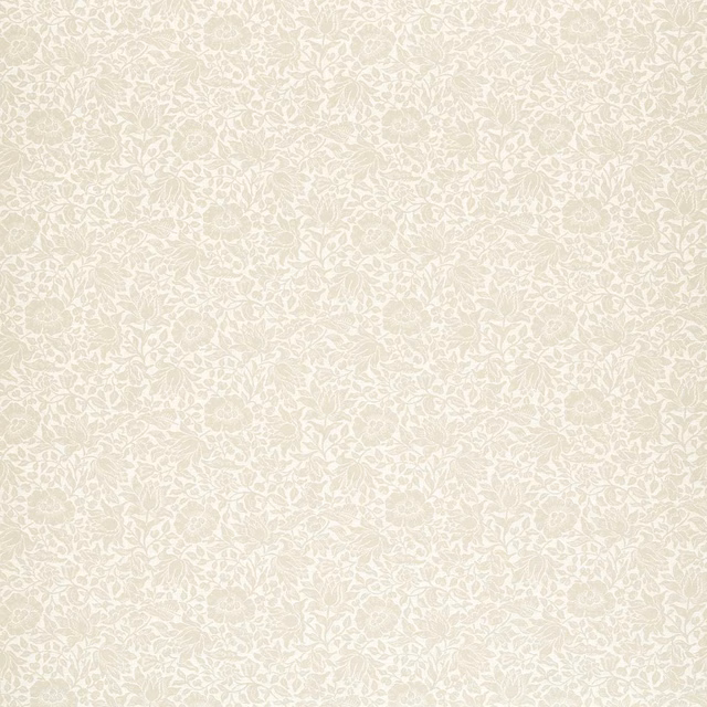 Pale ivory woven fabric with dense delicate white botanical leaves and flowers