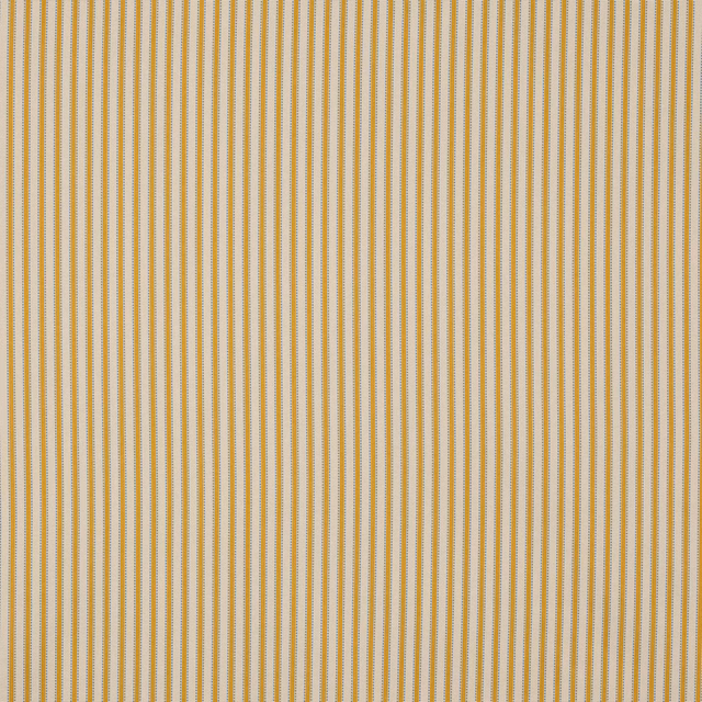 Close-up of narrow golden-yellow and pale vertical stripes on a light woven fabric