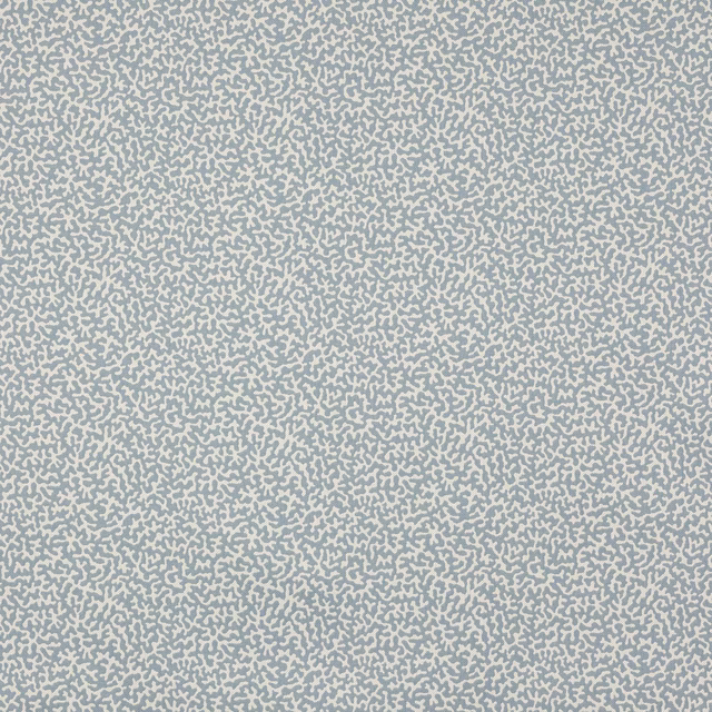 Pale blue patterned fabric swatch with tiny cream abstract marks