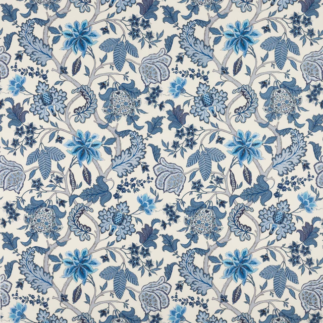 Blue floral linen fabric with scrolling vines on an ivory ground