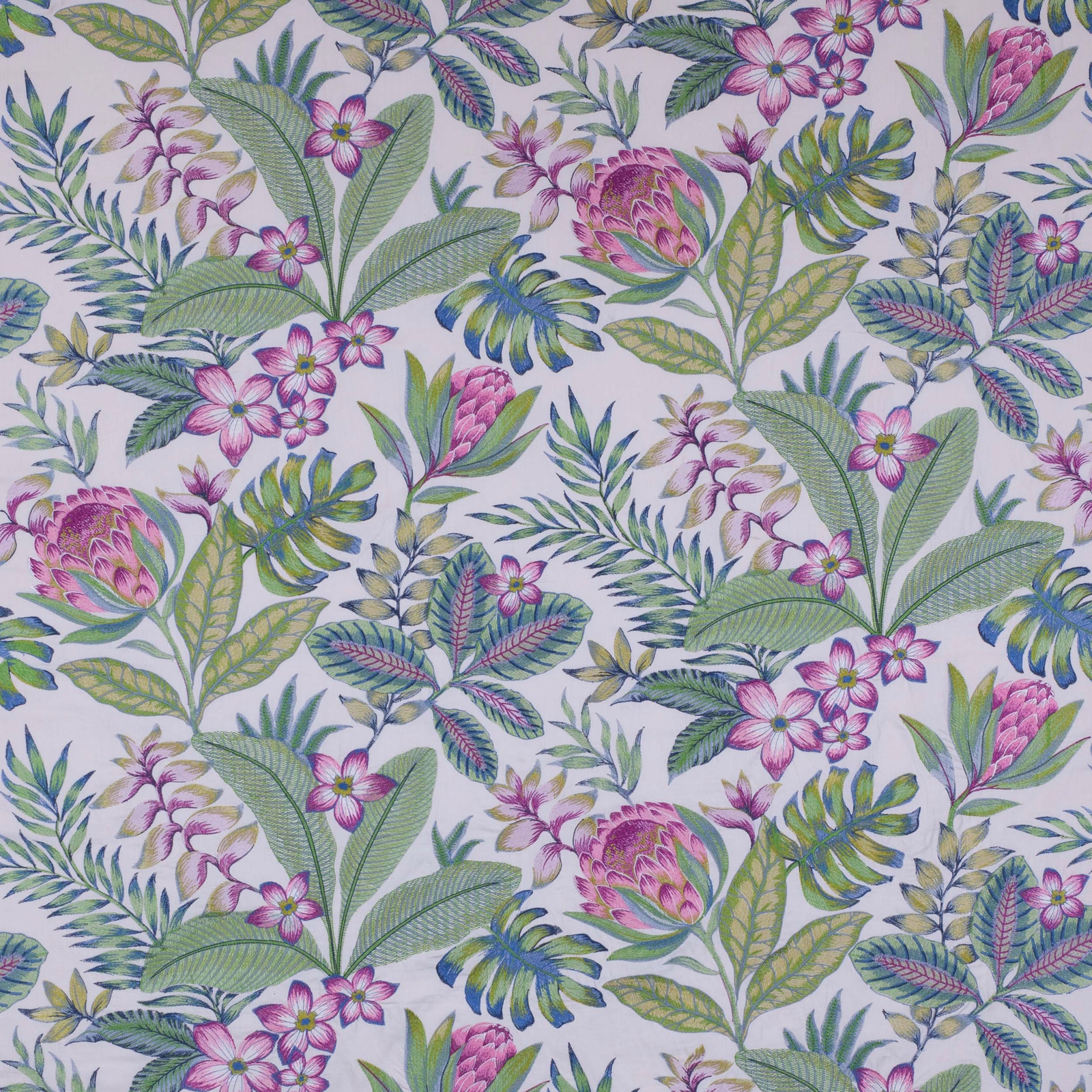 Botanical floral fabric swatch with rose, lilac, green and blue leaves on pale ground