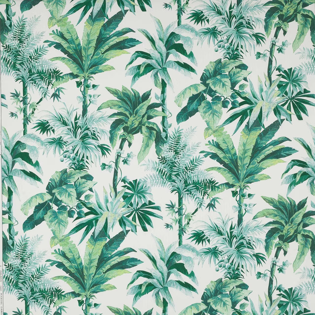 Green tropical leaf print on a pale ground, with layered palm fronds and ferns