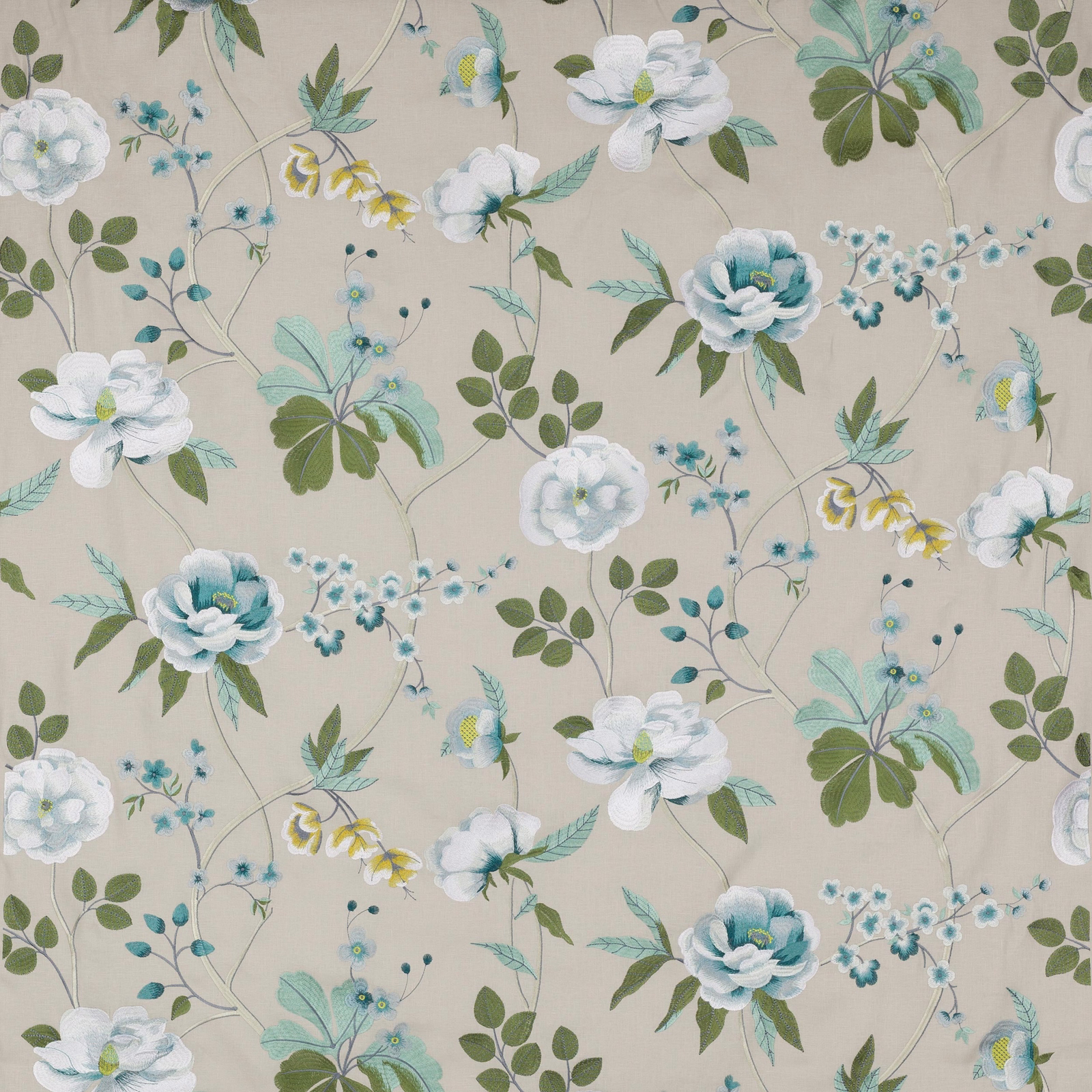 Large floral fabric swatch with white, jade and aqua blossoms on a beige ground