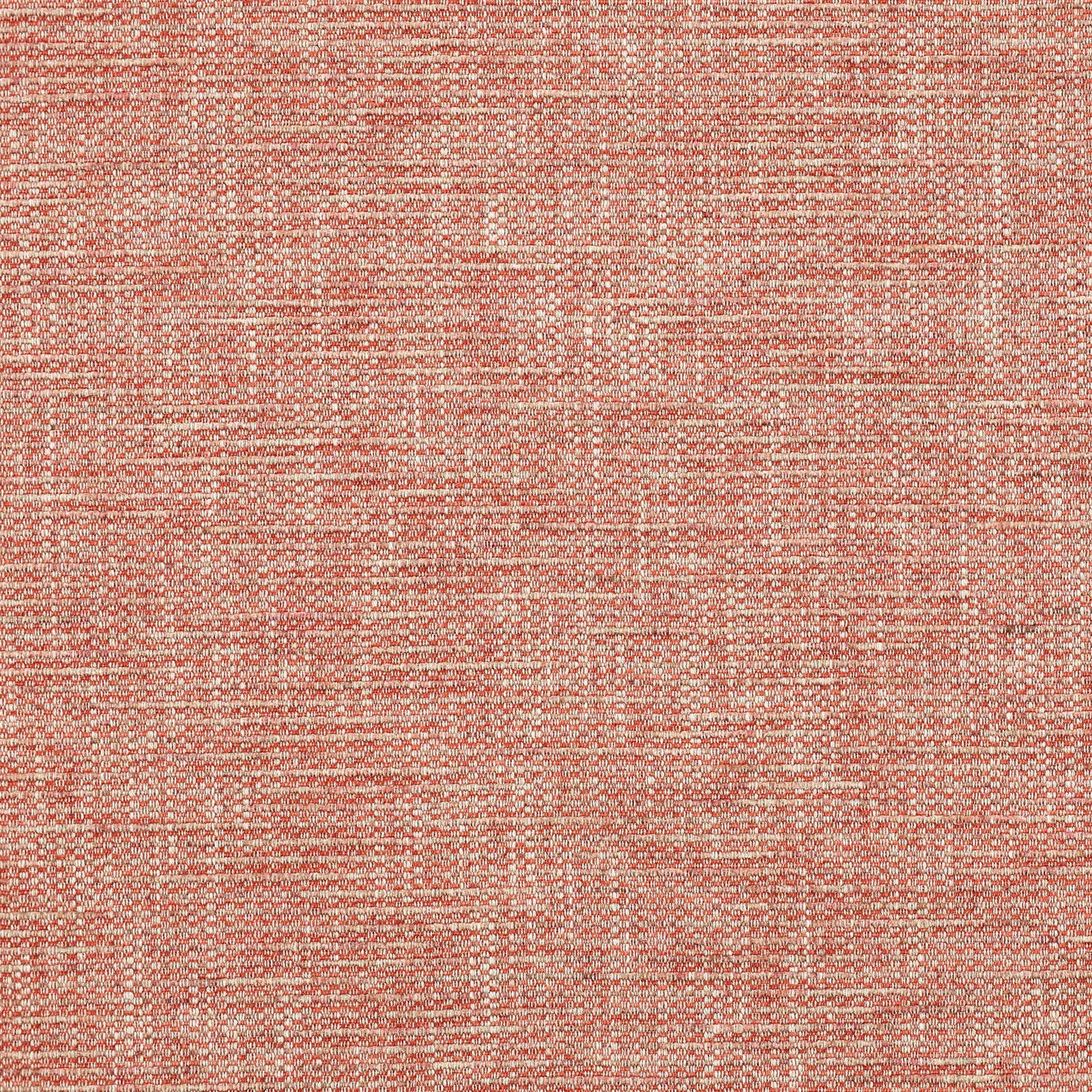 Close-up of muted coral-red woven fabric with a fine slub texture