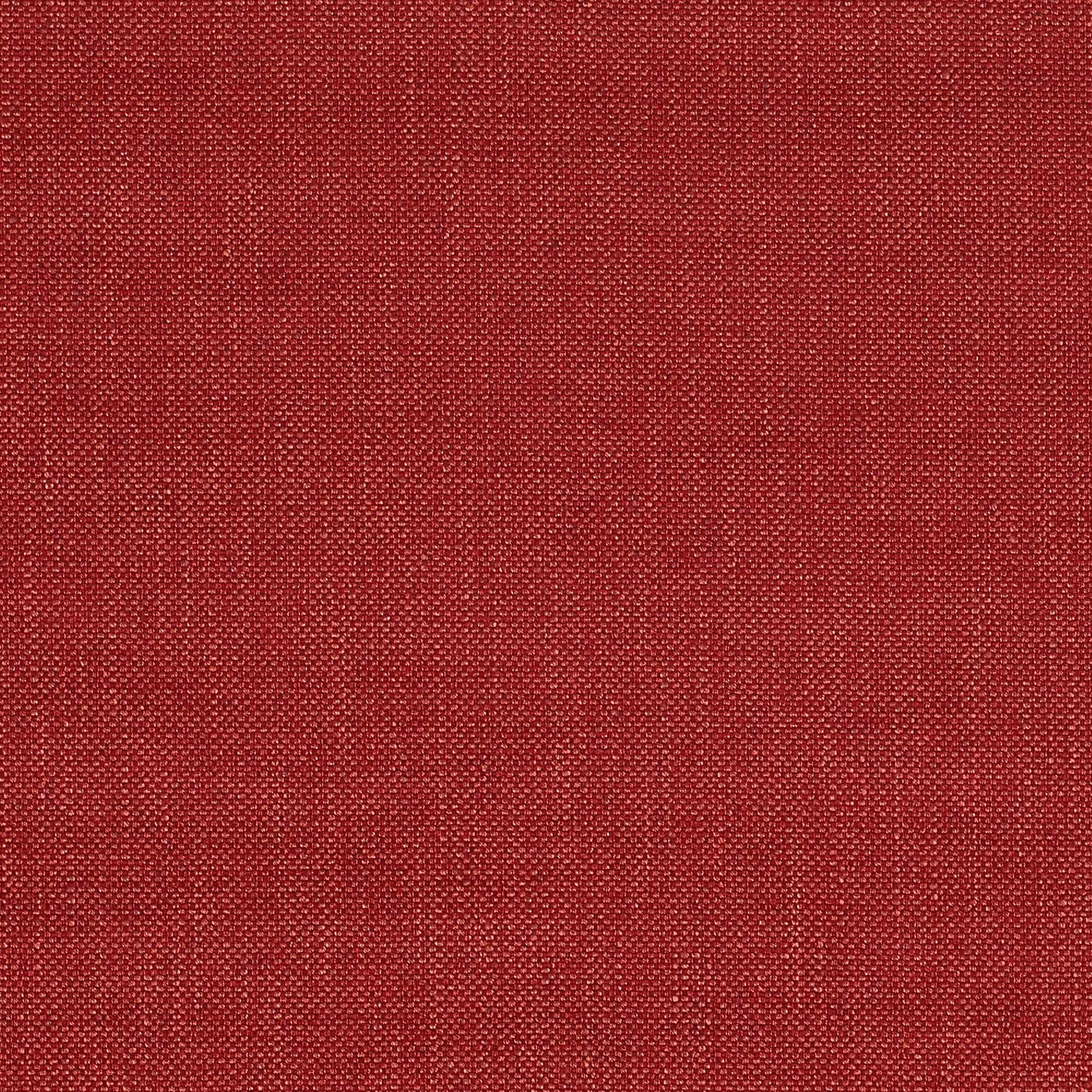 Close-up of a warm brick-red plain woven fabric with fine textured surface