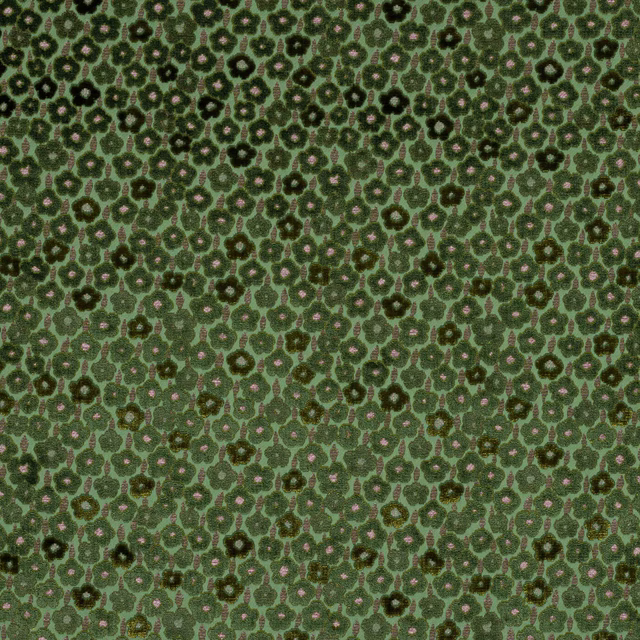 Close-up of moss green floral weave with dark olive motifs and tiny blush accents