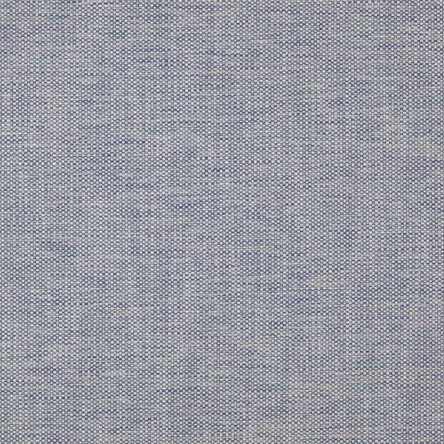 Close-up of a small woven turquoise-blue fabric with a fine textured surface.