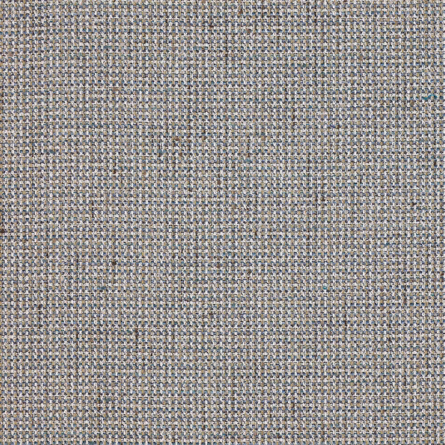 Close-up of a cool slate-grey woven fabric with tiny blue and beige flecks.